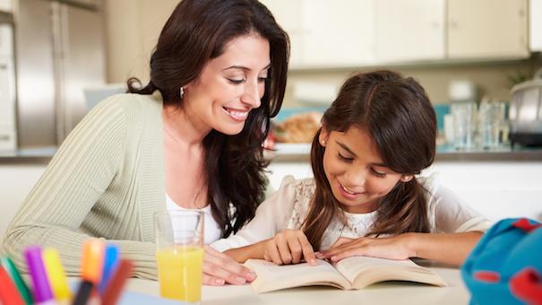 mother-teaching-daughter-reading