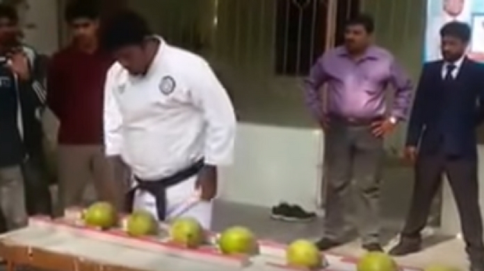 Guinness world record of breaking green coconuts