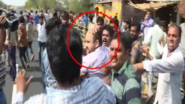 farmer strike farmers tries manhandle district collector