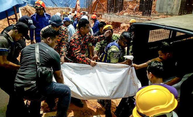 11 died in malaysia landslide