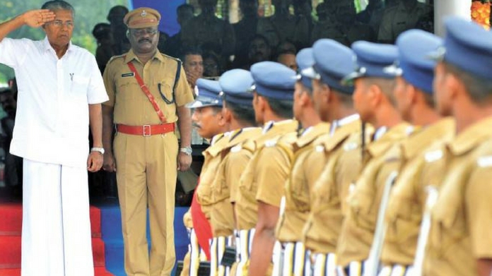 Pinarayi Vijayan with police