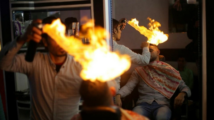 mumbai salon uses fire for hair cutting