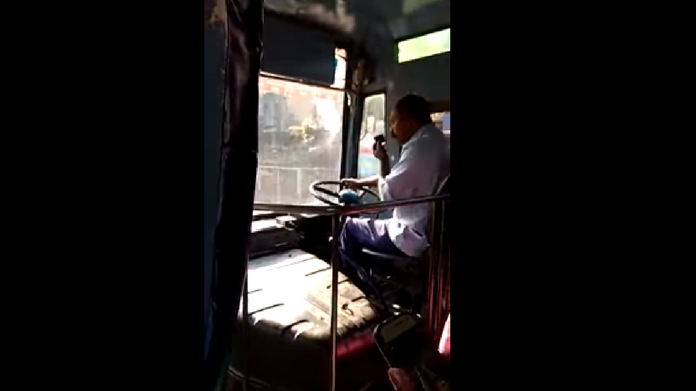 KSRTC driver repairs mobile while driving video
