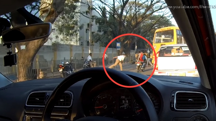 Bangalore Traffic Police Cop Throwing Chappal