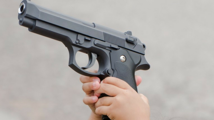 kid accidentally shoots mother with gun