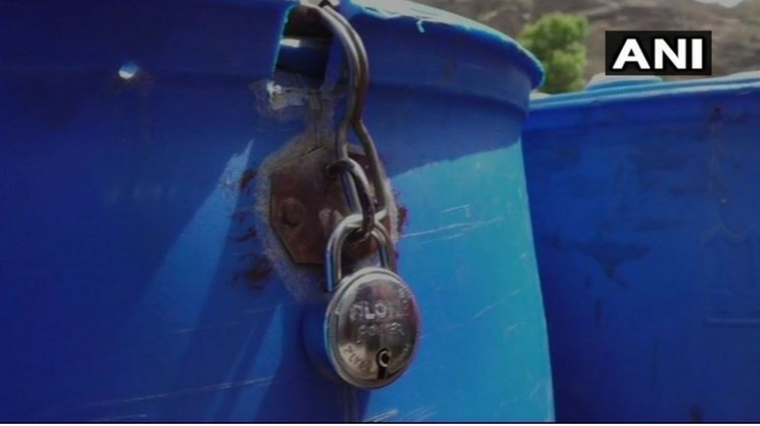people locks water tank to prevent robbery