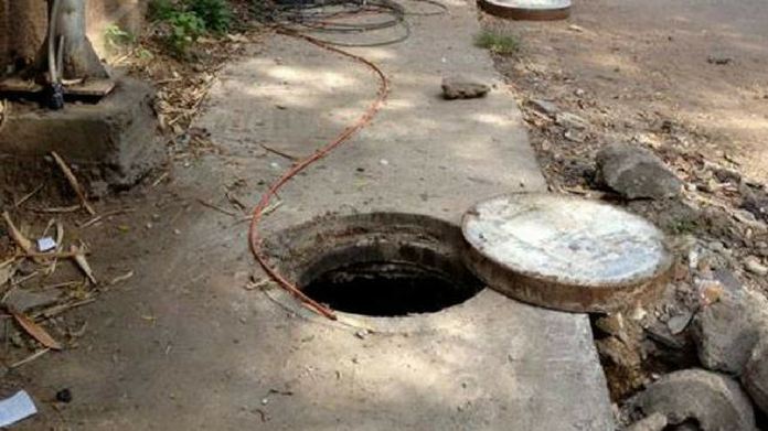 7 year old fell into manhole dead