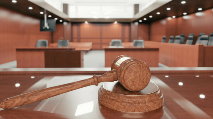 trainee constable arrested for taking selfi sitting on a judges chair