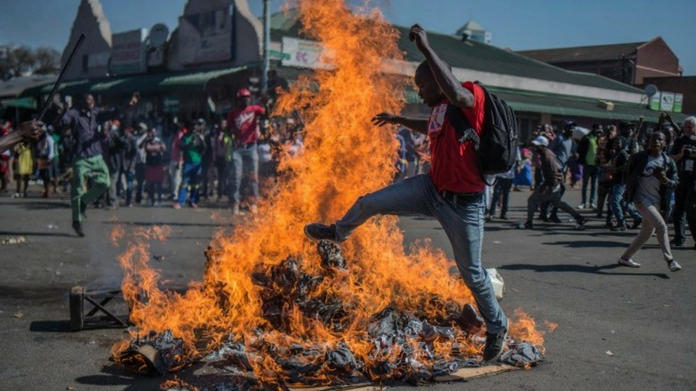 At least 3 killed after Zimbabwe troops fire upon protesters
