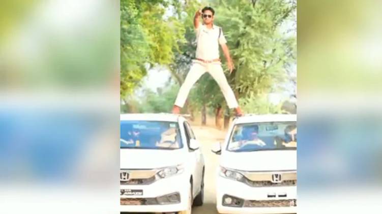 Cop imitates Ajay Devgn Movie stunt video