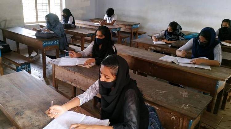 school covid guidelines tightens