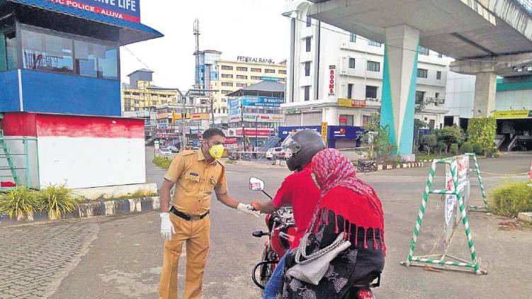 police strengthens covid protocols in aluva market