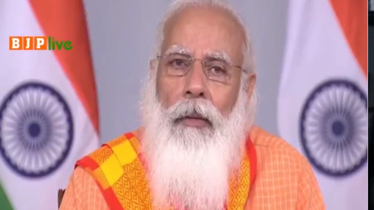 Modi Chokes Tribute Covid
