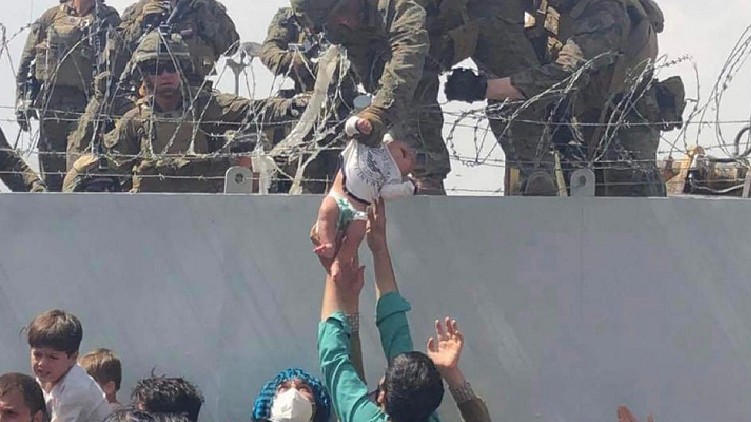Afghan Baby Reunited With Father