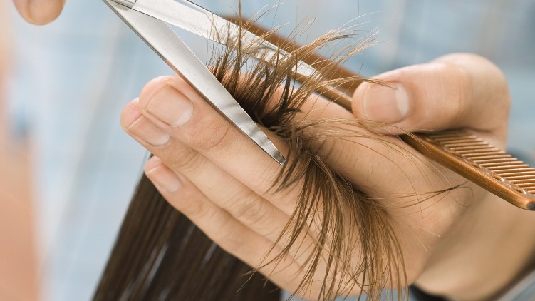 Woman compensation wrong haircut