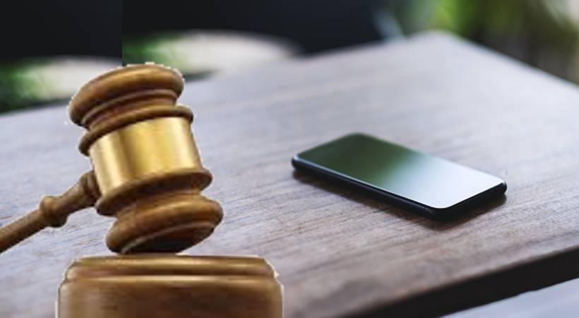 thrissur court mobile phone compensation