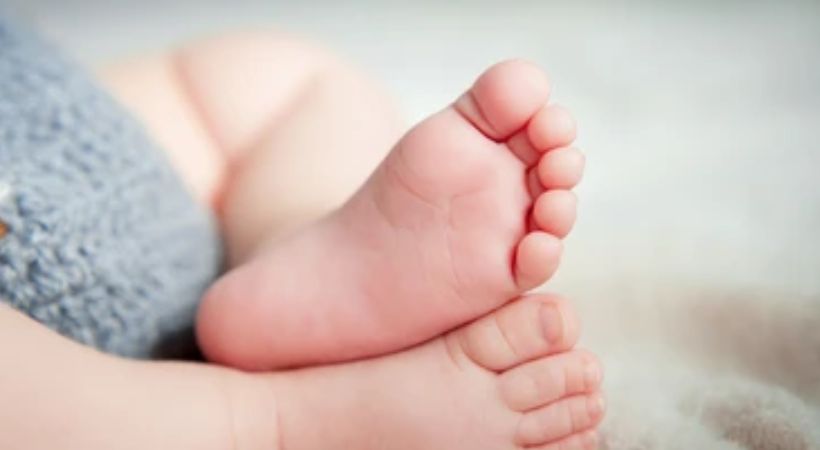 mother threw her 13 months old baby into river