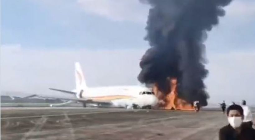 plane caught fire china