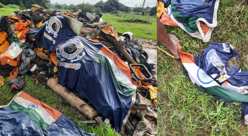 national flag was left in the garbage heap