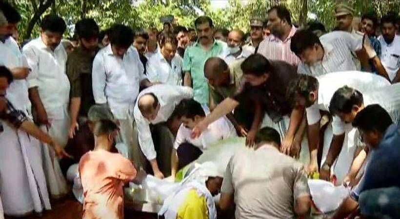 aryadan muhammed buried with official honors