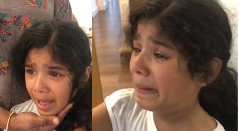 child cries watching queen Elizabeth death news