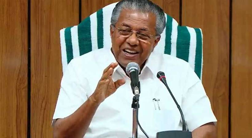 pinarayi vijayan reacts foreign travel family members