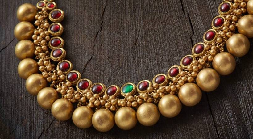 gold rate drops by 15rs