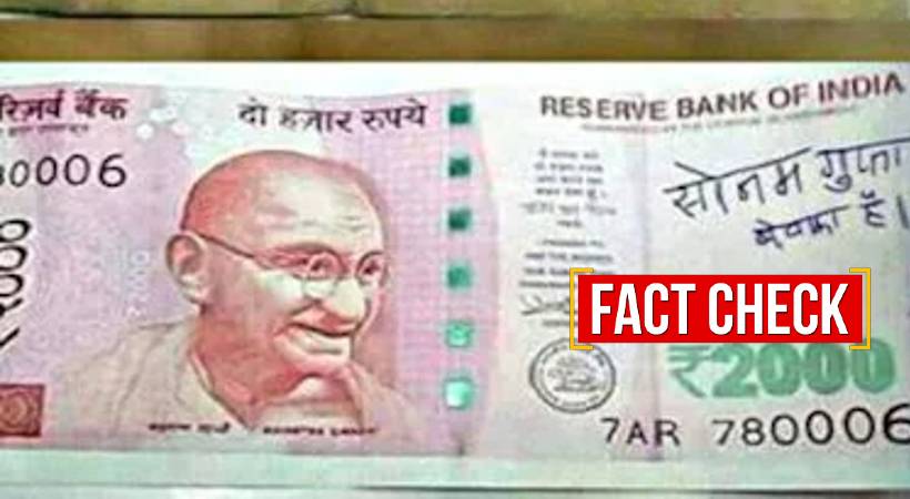 writing over indian currency