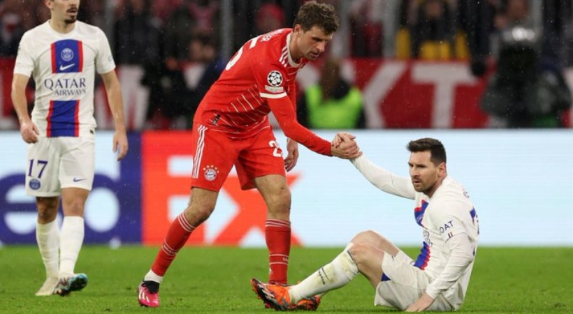 Thomas Muller and Lionel Messi in field