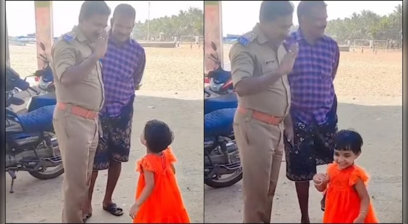 Kerala Police shares video of little girl saluting a cop