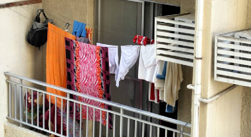 Oman restricted clothes drying at open balcony