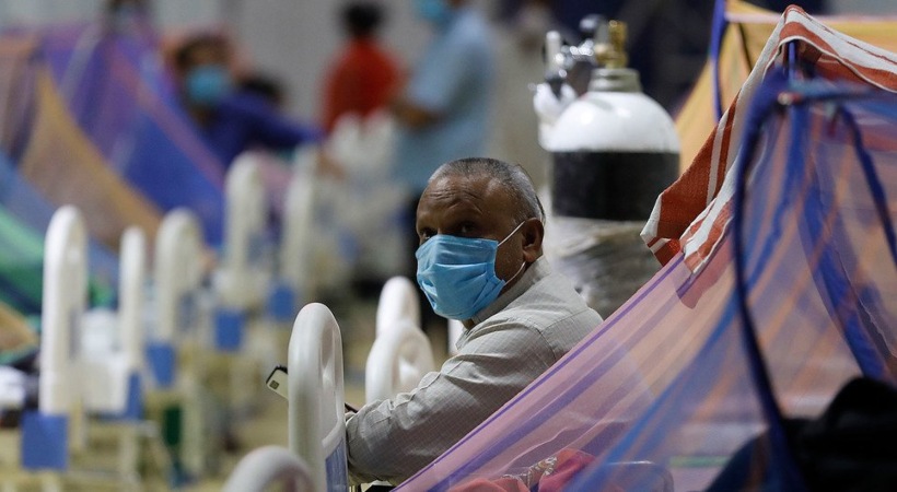 Patients receive treatment in the COVID-19 care centre at the Commonwealth Games Village (CWG) in New Delhi, India