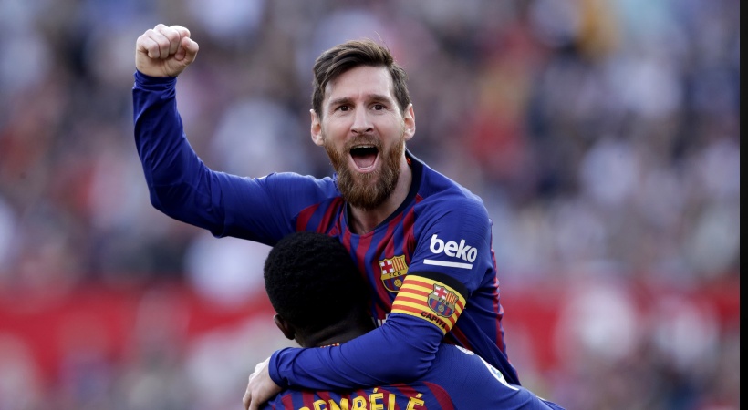 Messi and Dembele celebrating in Barcelona Jersey