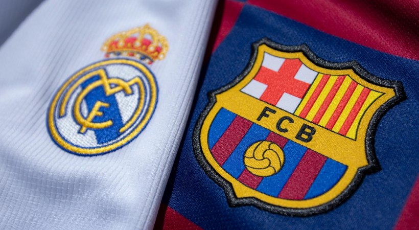 Logos of FC Barcelona and Real Madrid