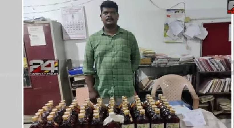 youth arrested with 60 bottle liquor