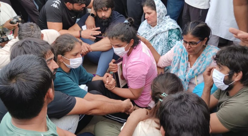 Images of wrestlers protest
