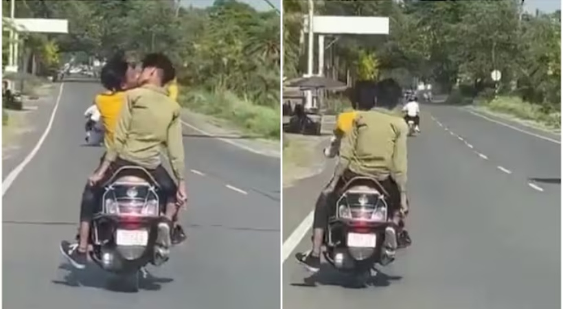 2 men kiss each other while riding scooty in UP