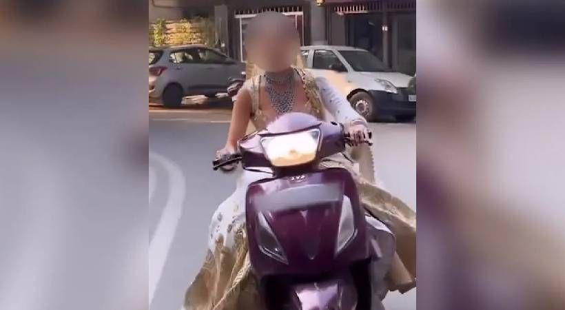 bride rides scooter without helmet fine