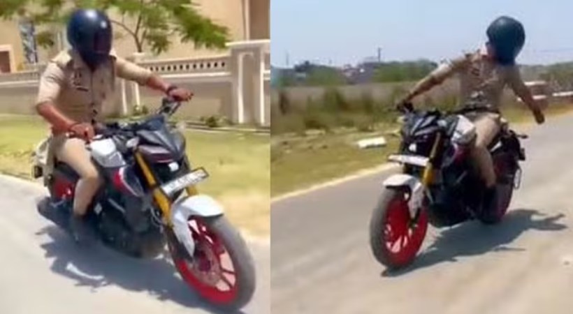 up police reel bike stunts uniform suspended