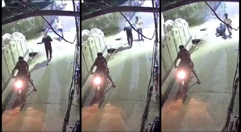 UP Man Carrying Little Daughter On Shoulders Shot At Close Range
