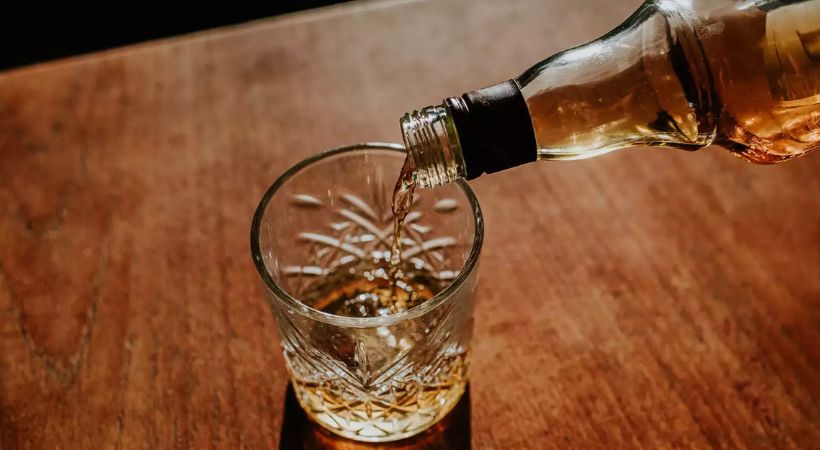 liquor in college tour bus; Case against principal