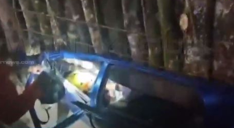 man trapped in his car under a timber lorry for an hour