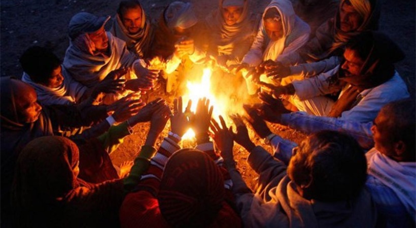 To beat chill; 2 passengers light bonfire with dung cakes on train; arrested