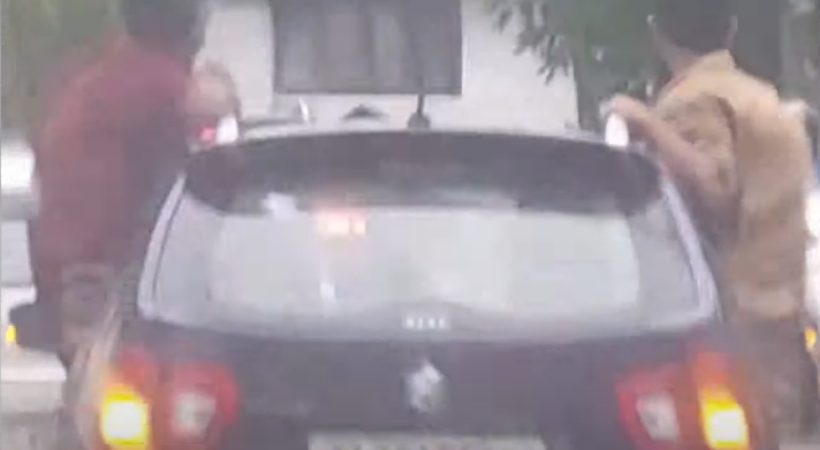 kozhikode students careless car driving with 2 students standing in back doors
