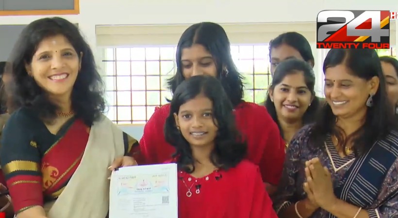 Varma Homes hands over 50 lakhs flat to Flowers Top singer Nivedita