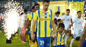 Children of Wayanad holding hands of ISL players