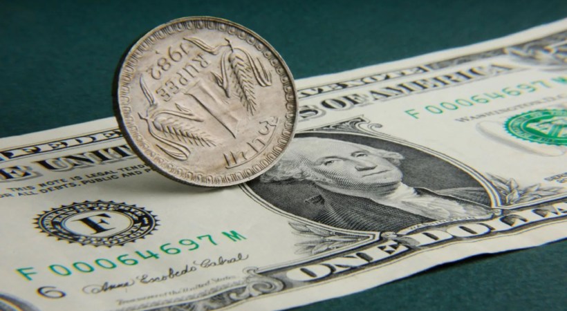Rupee at record low, crosses 87 per US dollar for the first time