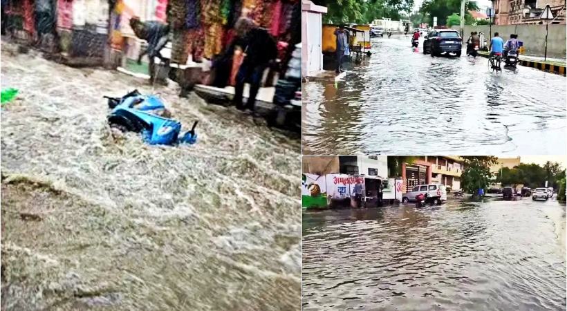 heavy rain in rajasthan ajmer flood sweep away vehicles